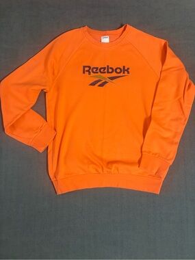 Reebok Men’s Bright Orange Crewneck Sweatshirt with Navy Logo